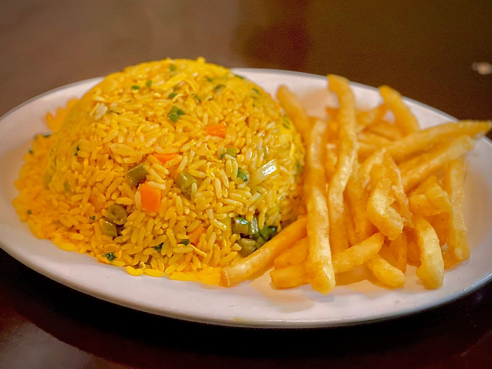 Arroz con Pollo + Refresco Natural