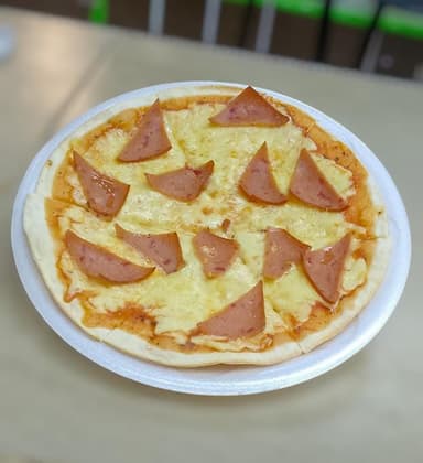 Pizza full con todo 6 porciones