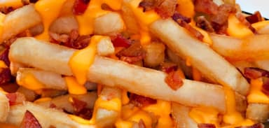 Papas con Buffalo Sauce