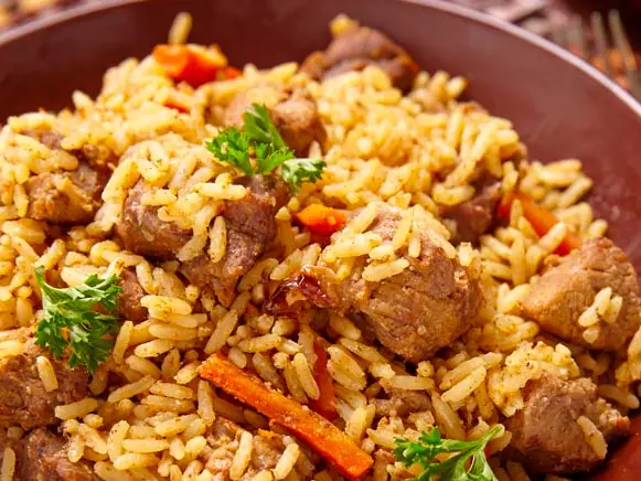Combo Arroz Paisa con Chuleta y Papas