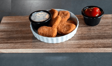 8 Nuggets de Pollo