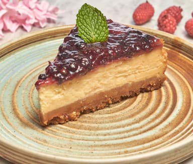 Porción Cheescake Frutos Rojos