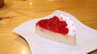 Porción de Cheesecake de Cereza