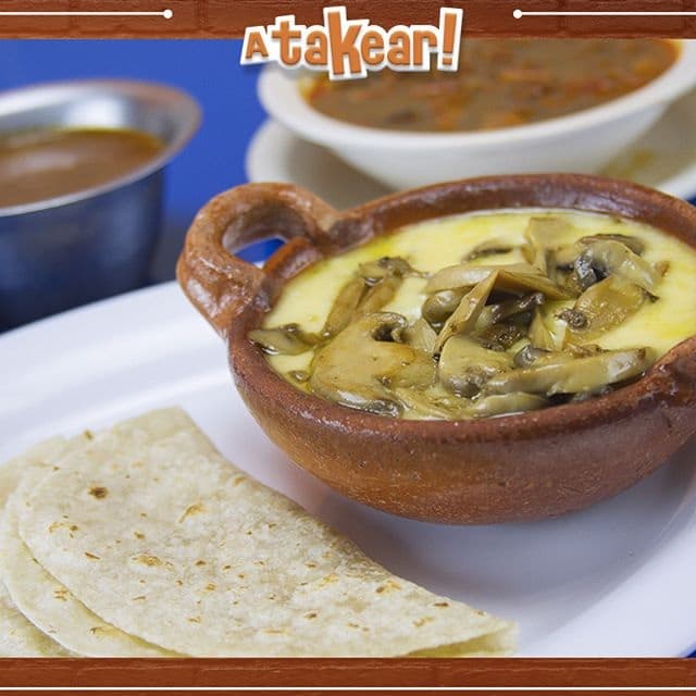 Queso Fundido con Champiñones
