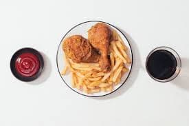 2 Piezas de Pollo Empanizado con papas