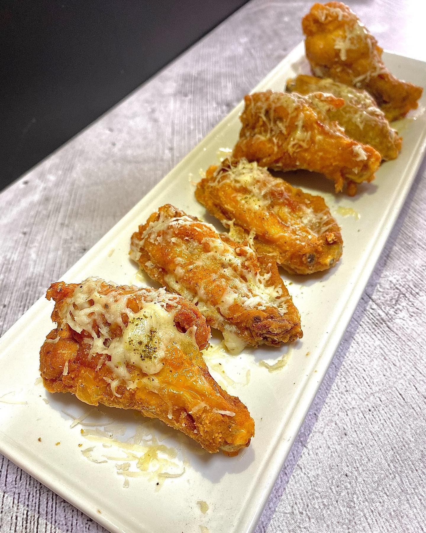 Alitas a la parmesana (6 unidades)