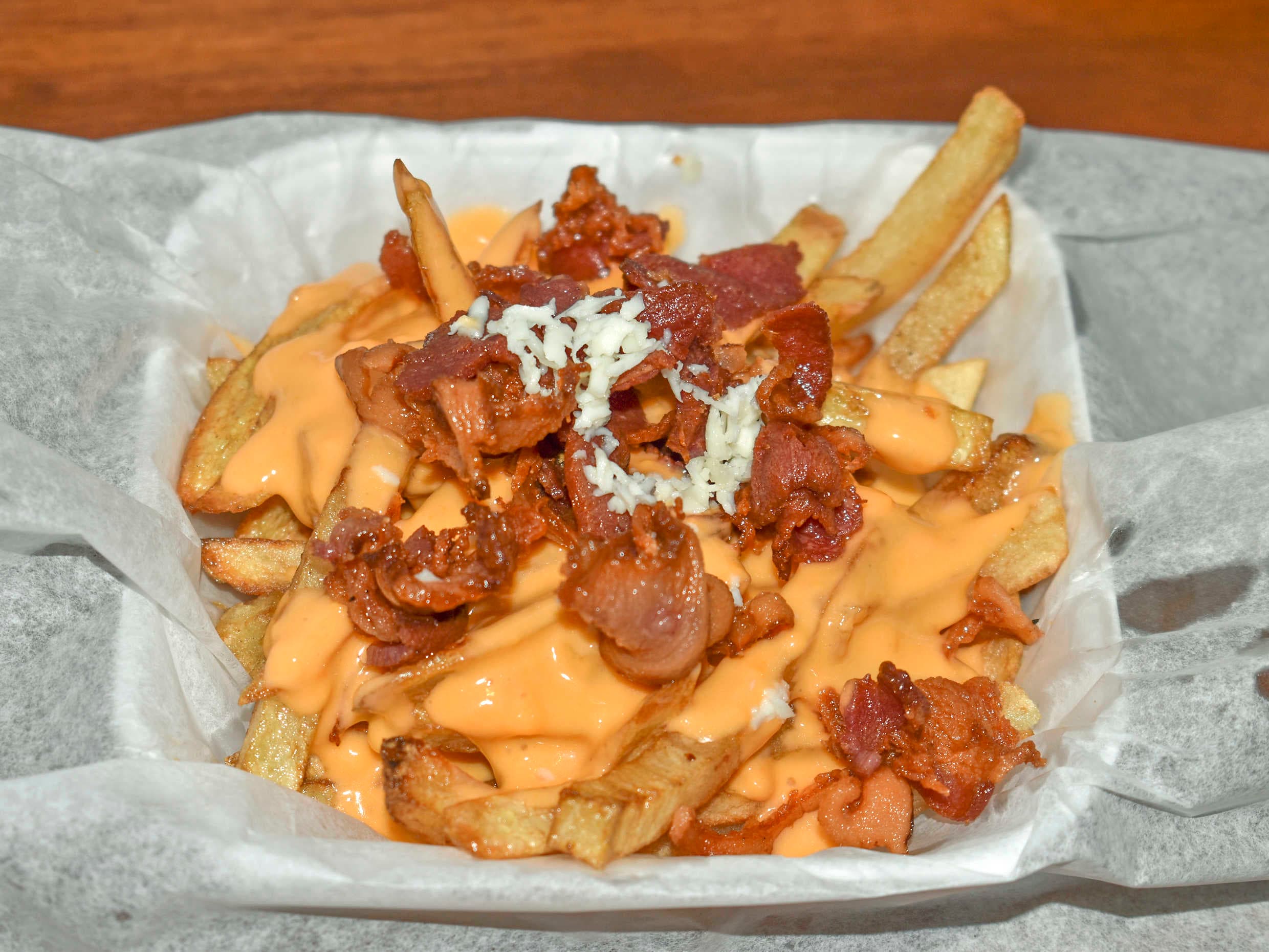 Orden de Papas con Queso y Tocino