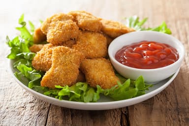 Nuggets de Pollo con Refresco Lata.