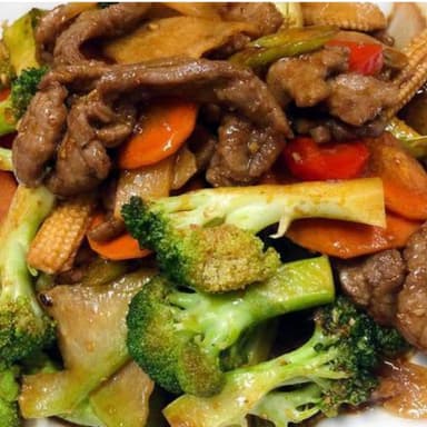63. Carne  Cerdo con Verduras en Salsa de Ostiones