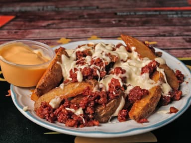 Papas Gajo con Chorizo y Queso Manchego Gratinado