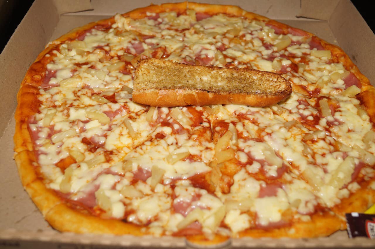 1 Pizza Tradicional..