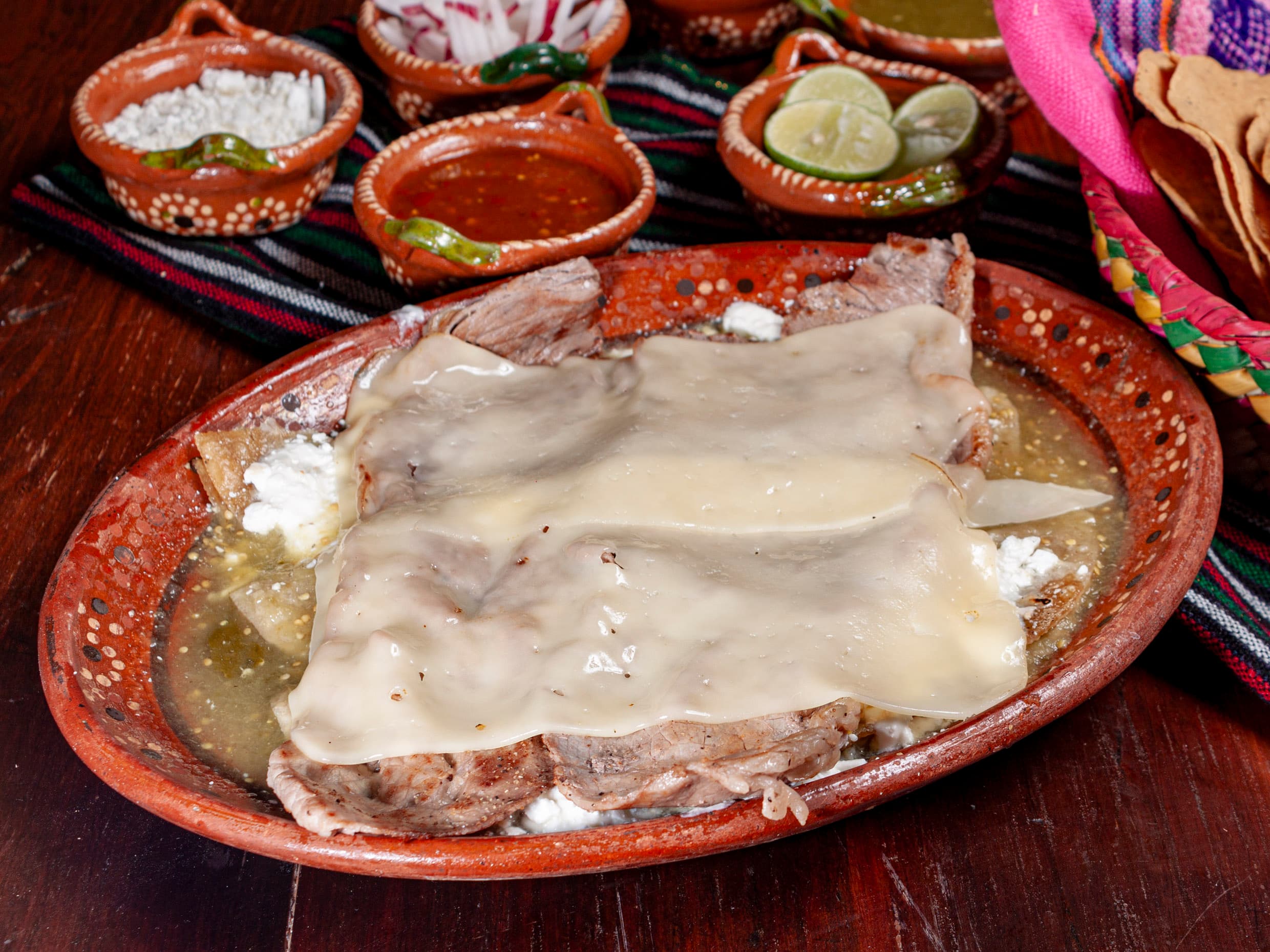 Enchiladas con carne asada gratinadas