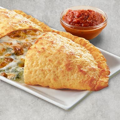 Calzone Spinach Alfredo y champiñones
