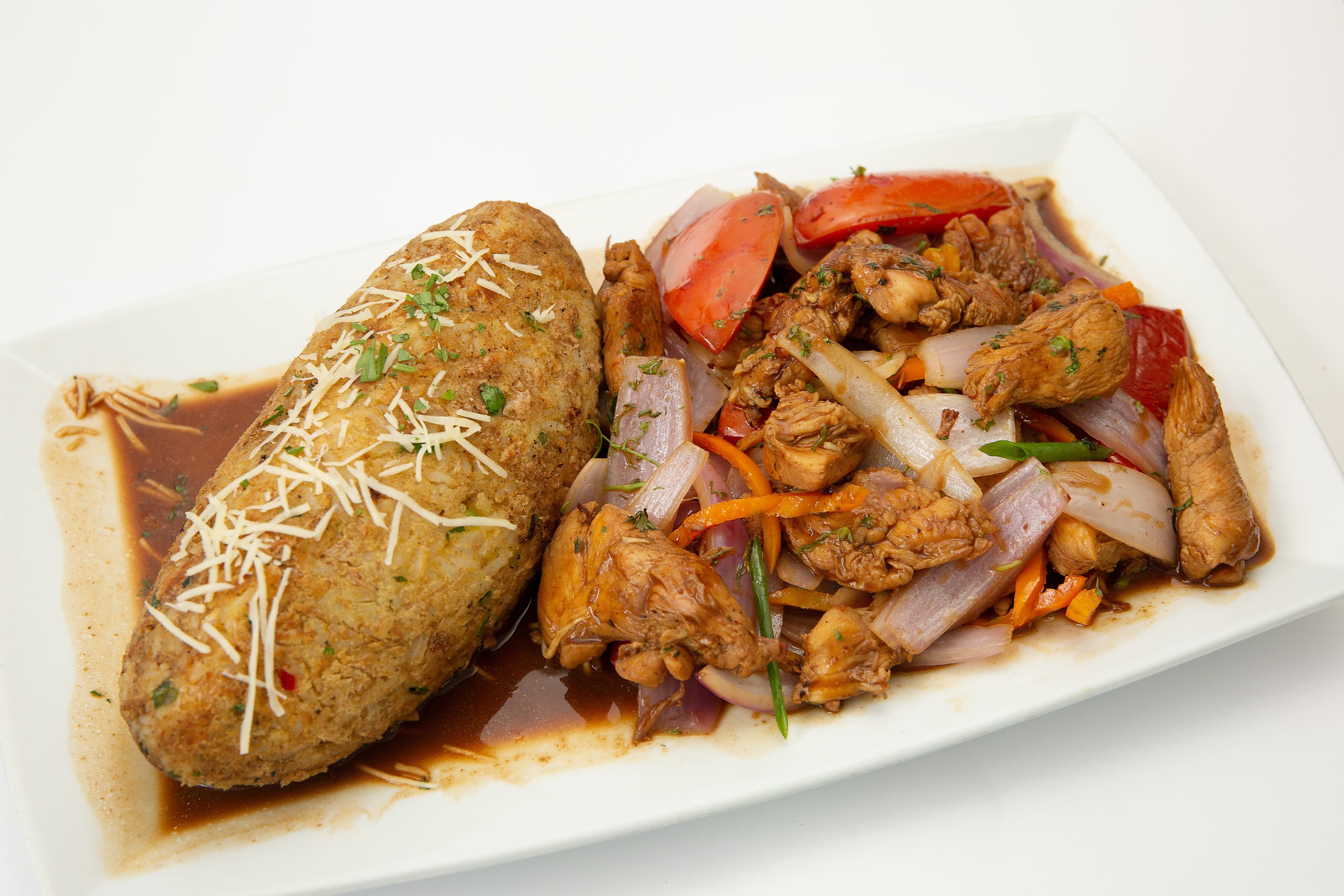 Pollo al Jugo con Tacu Tacu