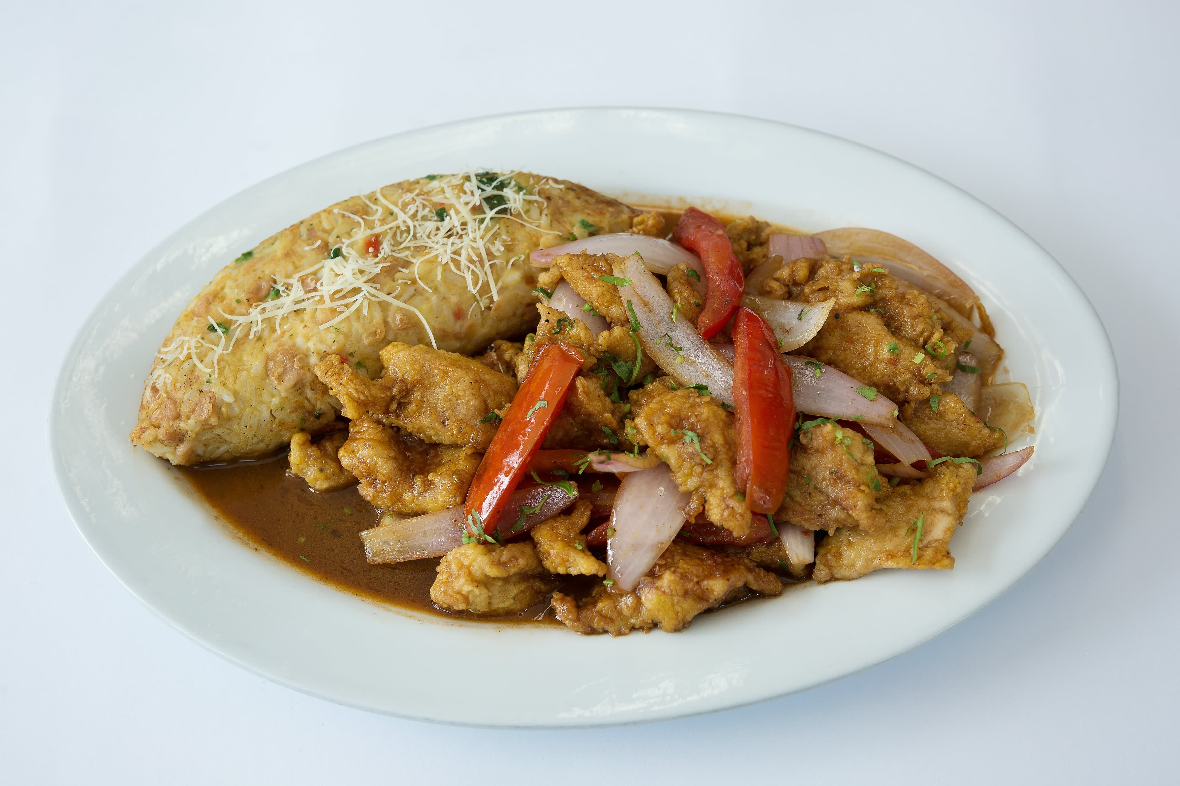 Pescado al Jugo Tacu Tacu
