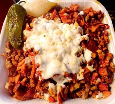 1 KG  de Carne al pastor con quesillo.