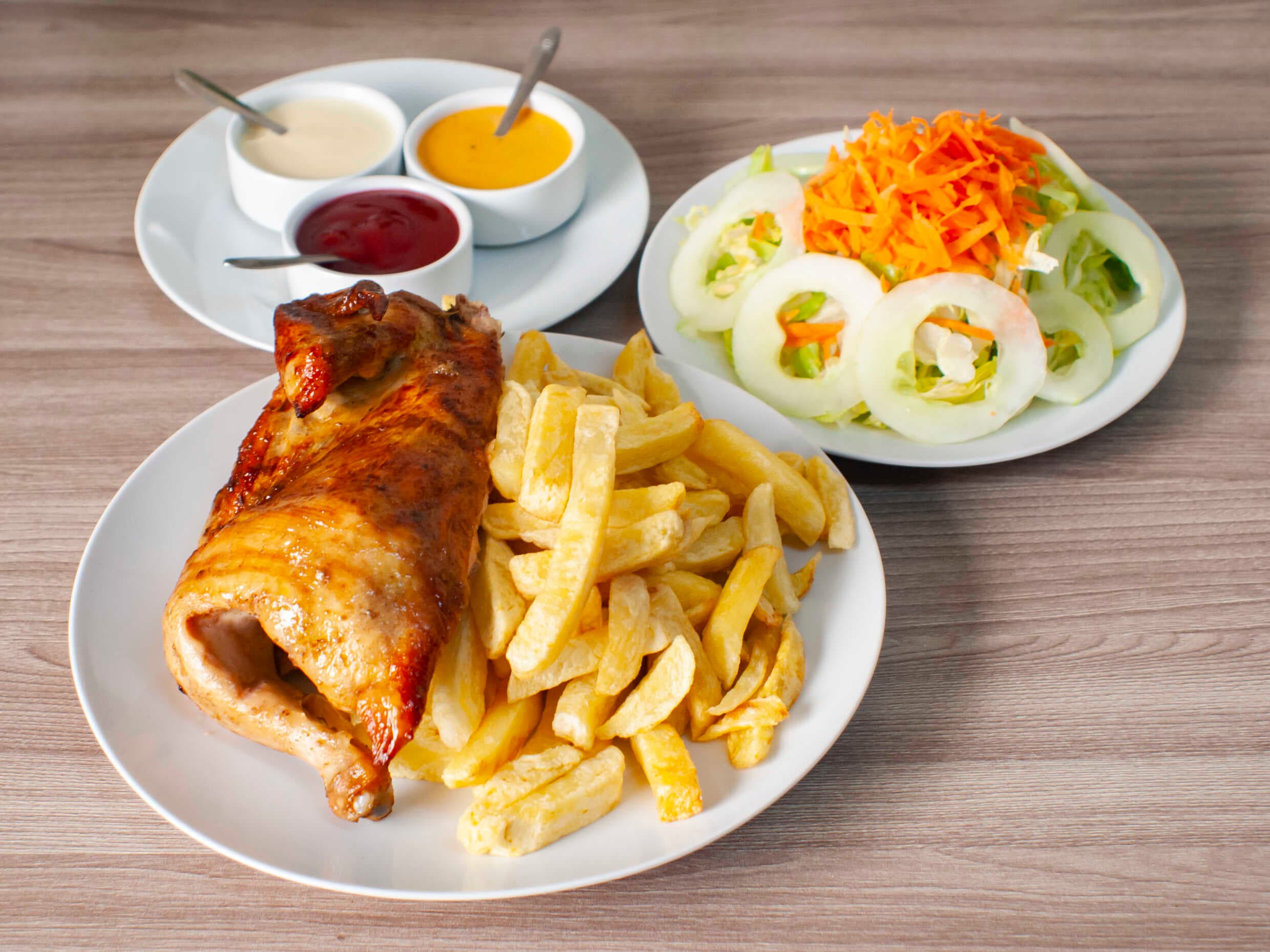 1/2 Pollo a la Brasa + Gaseosa 1L