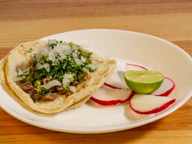 Taco de surtido de cabeza de puerco al vapor