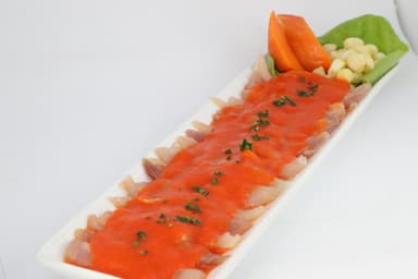 Tiradito de Pescado del Día en Crema de Rocoto