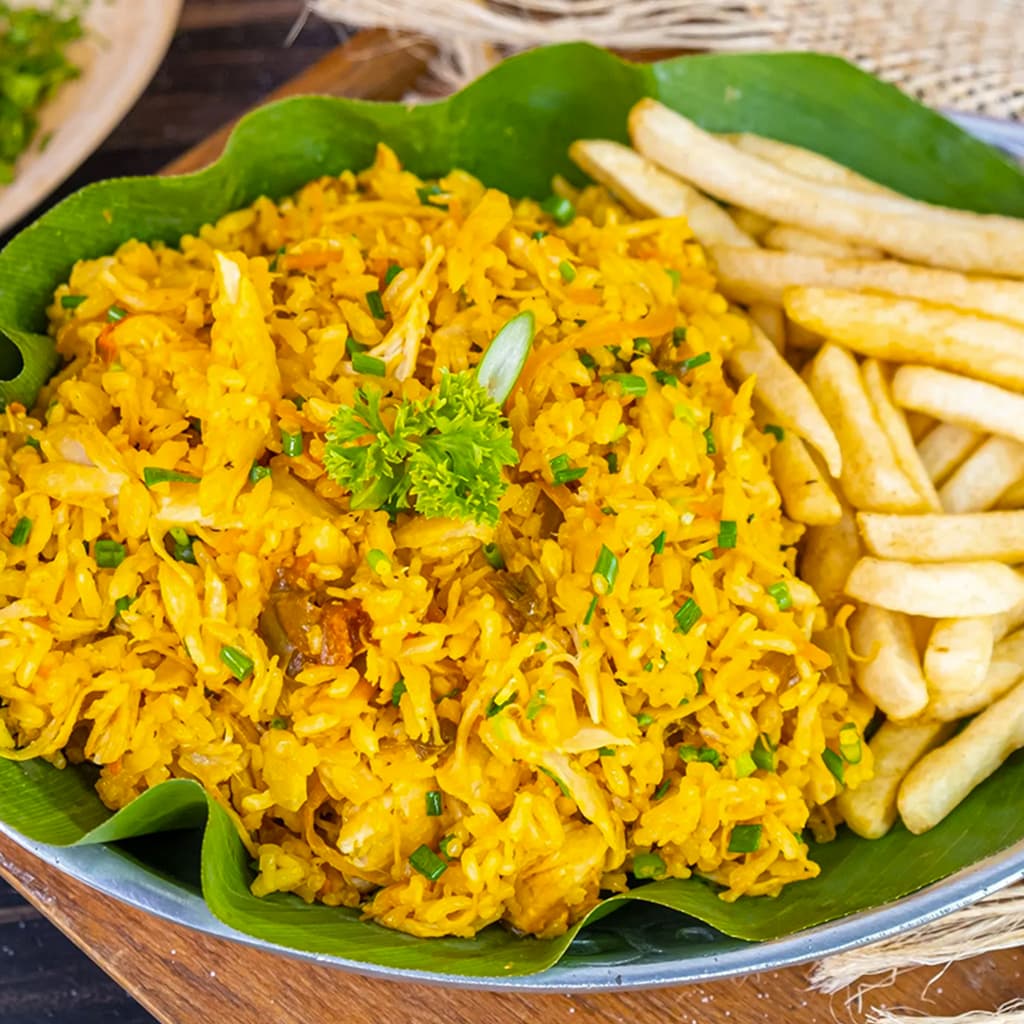 Medio Arroz de Pollo + Jugo de Corozo 12 Onz