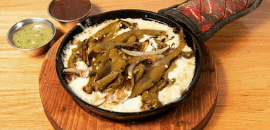 Queso Fundido con Champiñones