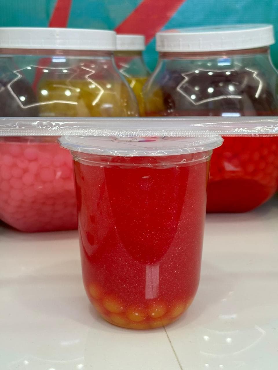 Fresa Glitter con Perlas Explosivas de Maracuyá