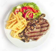 Chuleta a La Plancha con Papas Fritas y Ensalada