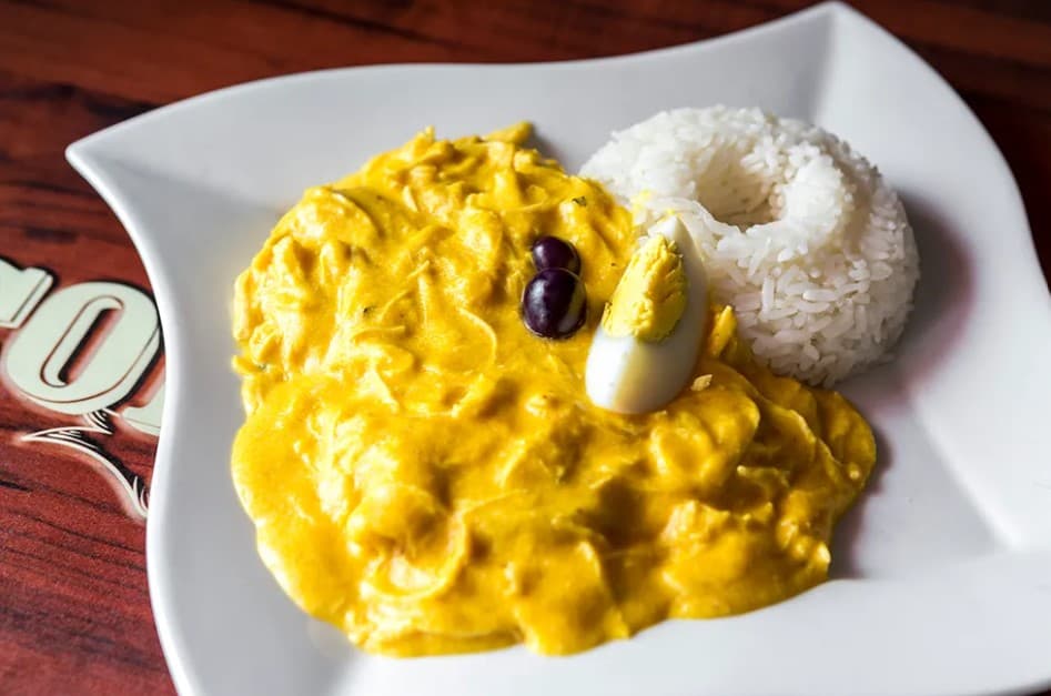 Ají de Gallina más Chicha