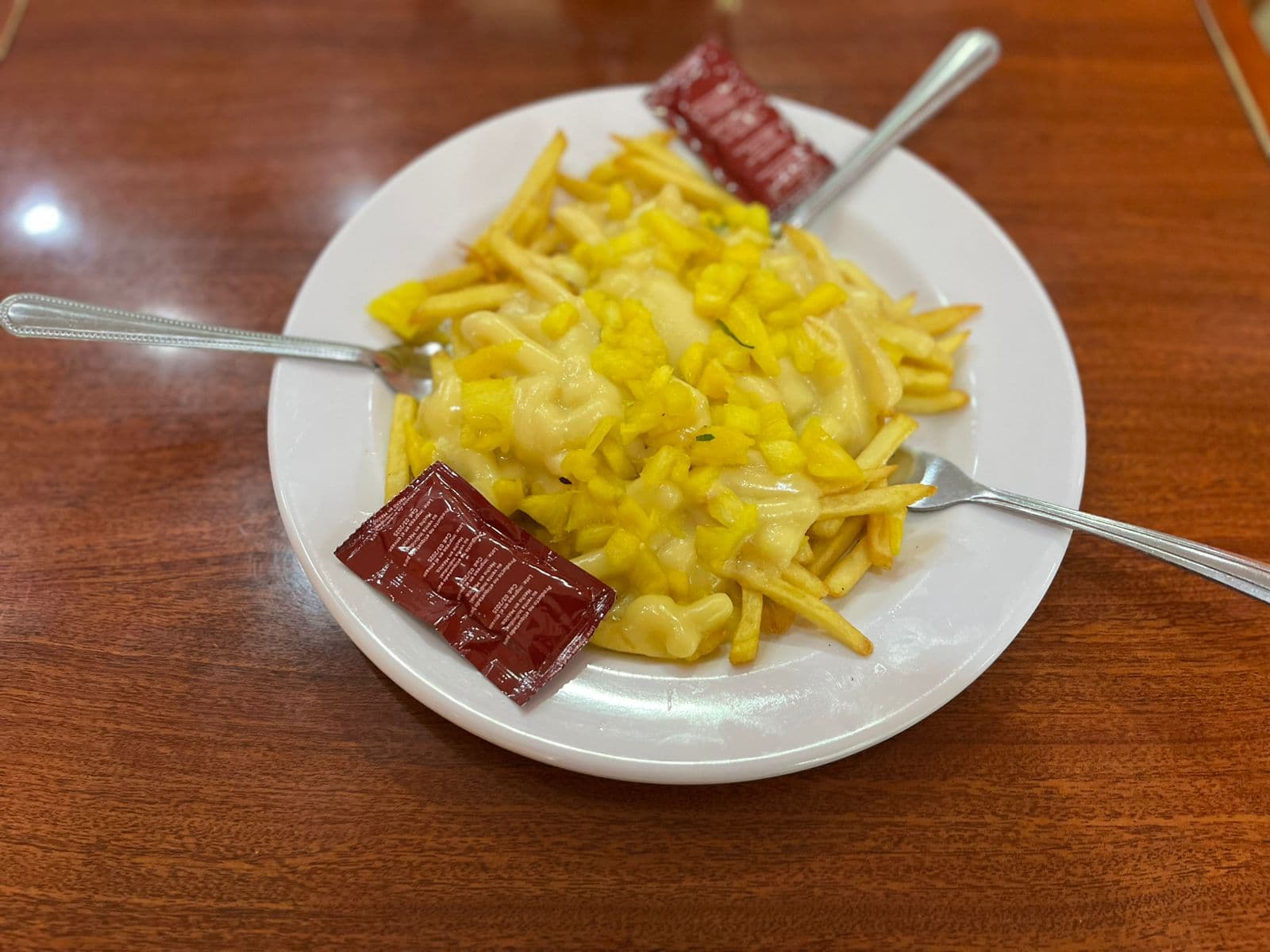 Orden de Papas con Queso y Piña