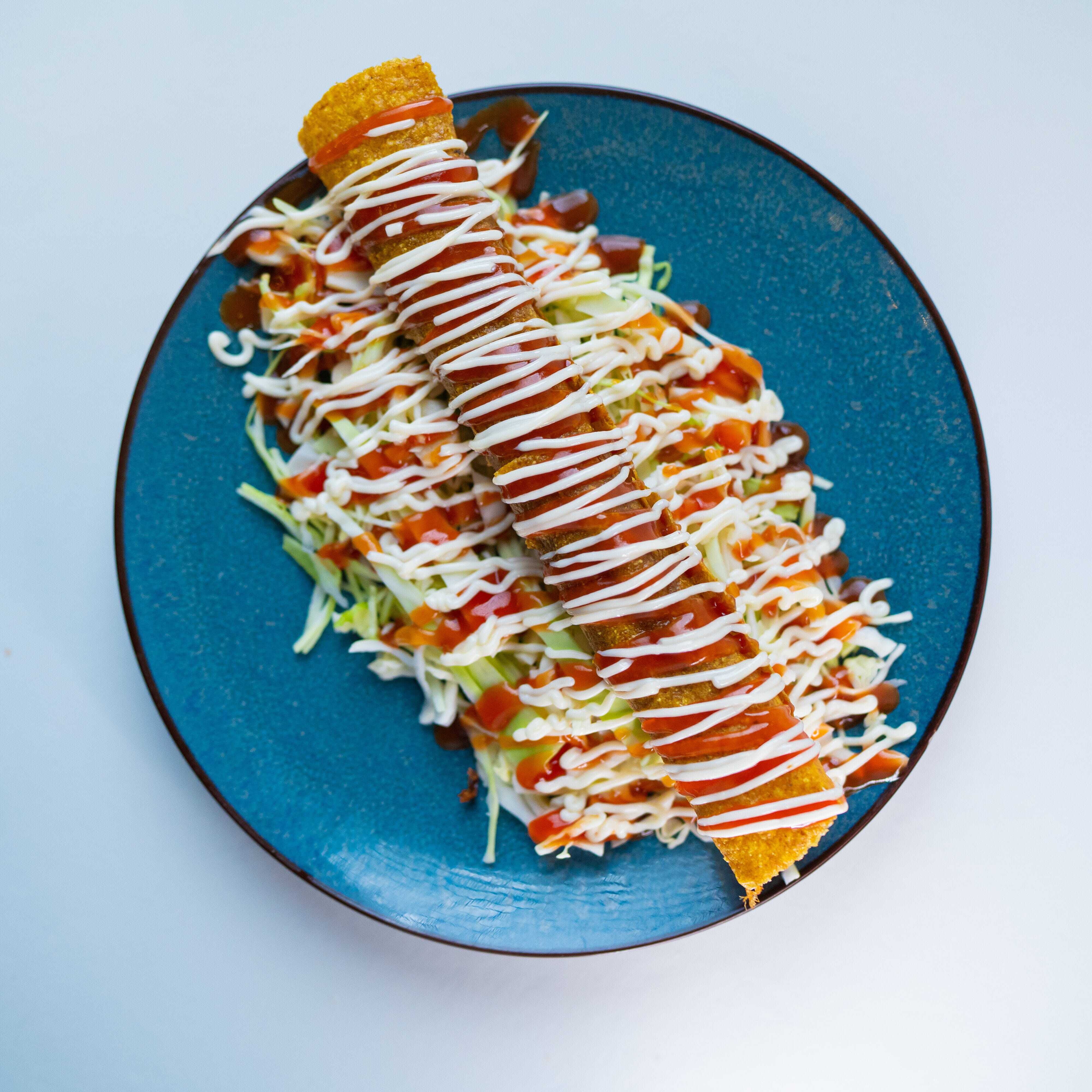 Taco con Repollo y Salsas
