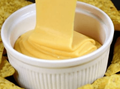 QUESO EXTRA EN UNAS PAPAS