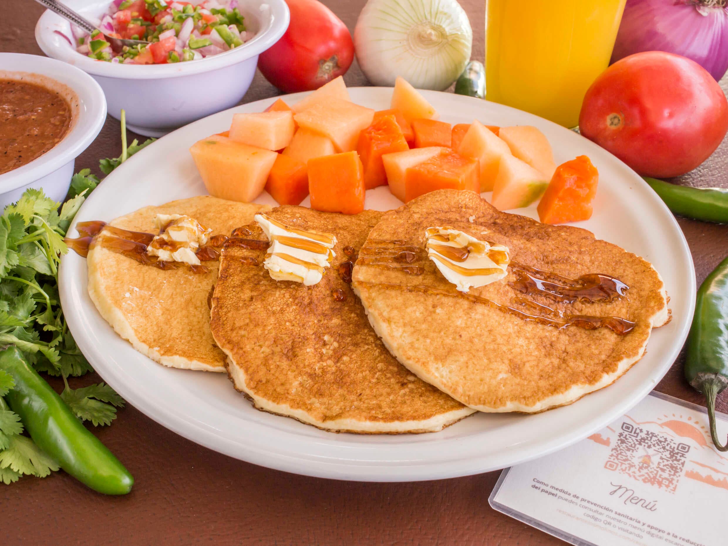 Combo 1: Molletes ( 2), Hot cakes (2)  1 Chocomilk