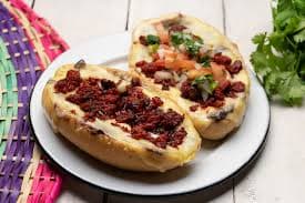 Molletes c/tocino o chorizo