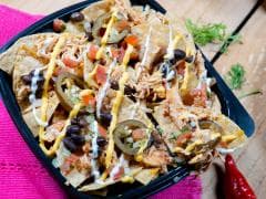 Nachos con pollo desmechado
