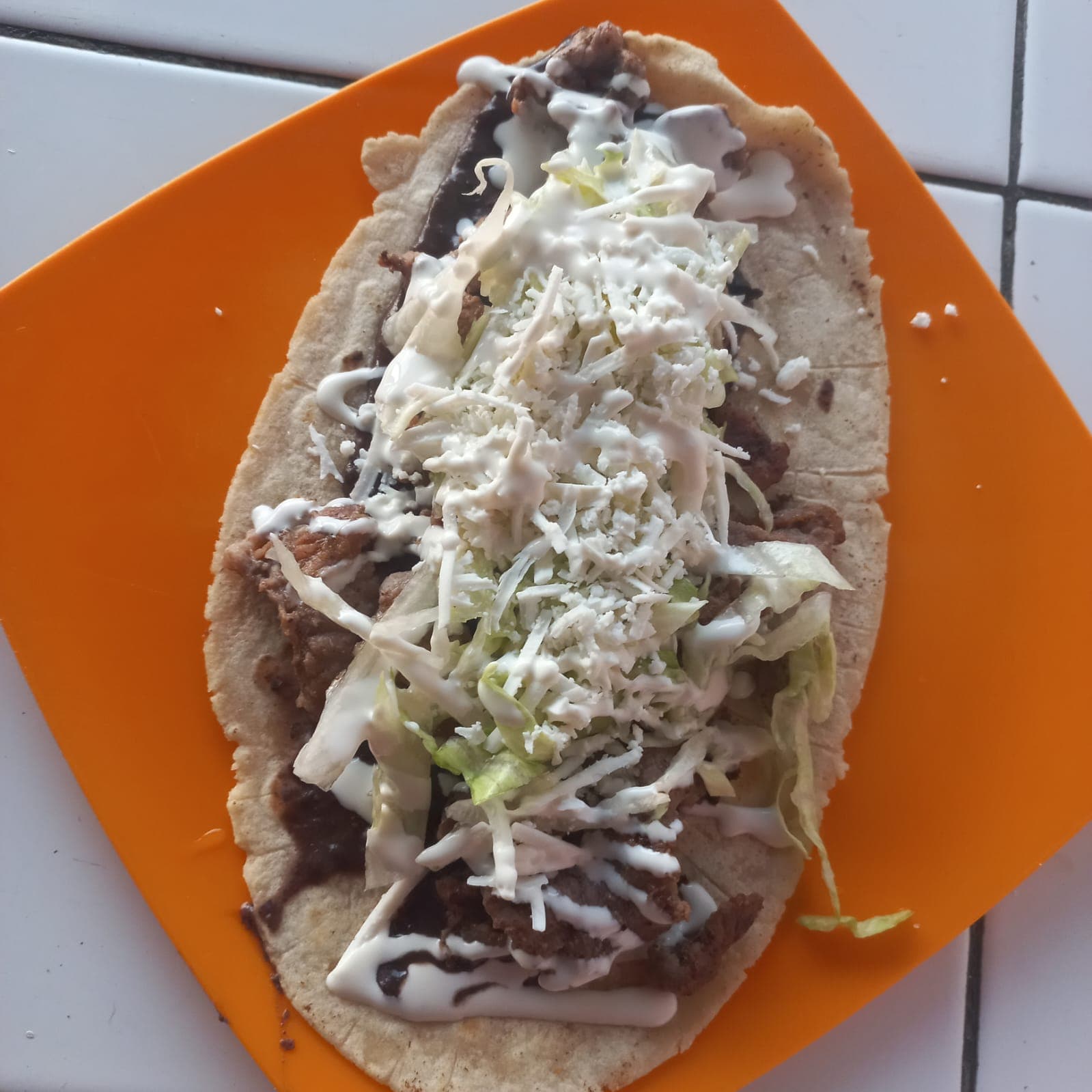 Huarache de Guisado de Tinga de Pollo