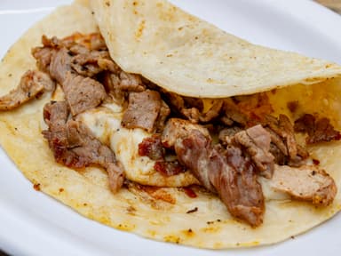 1 Taco de Parrilla con Costra de campechana