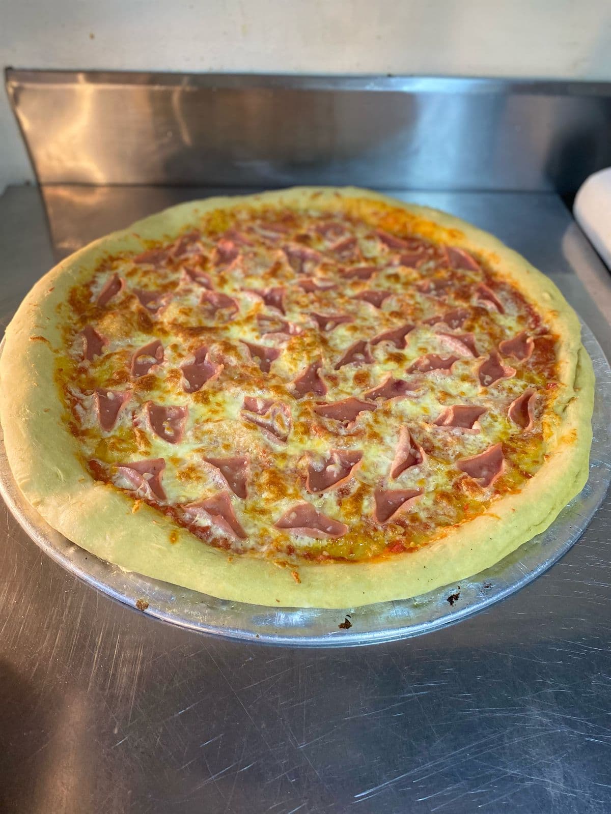 Pizza grande de Jamón y queso
