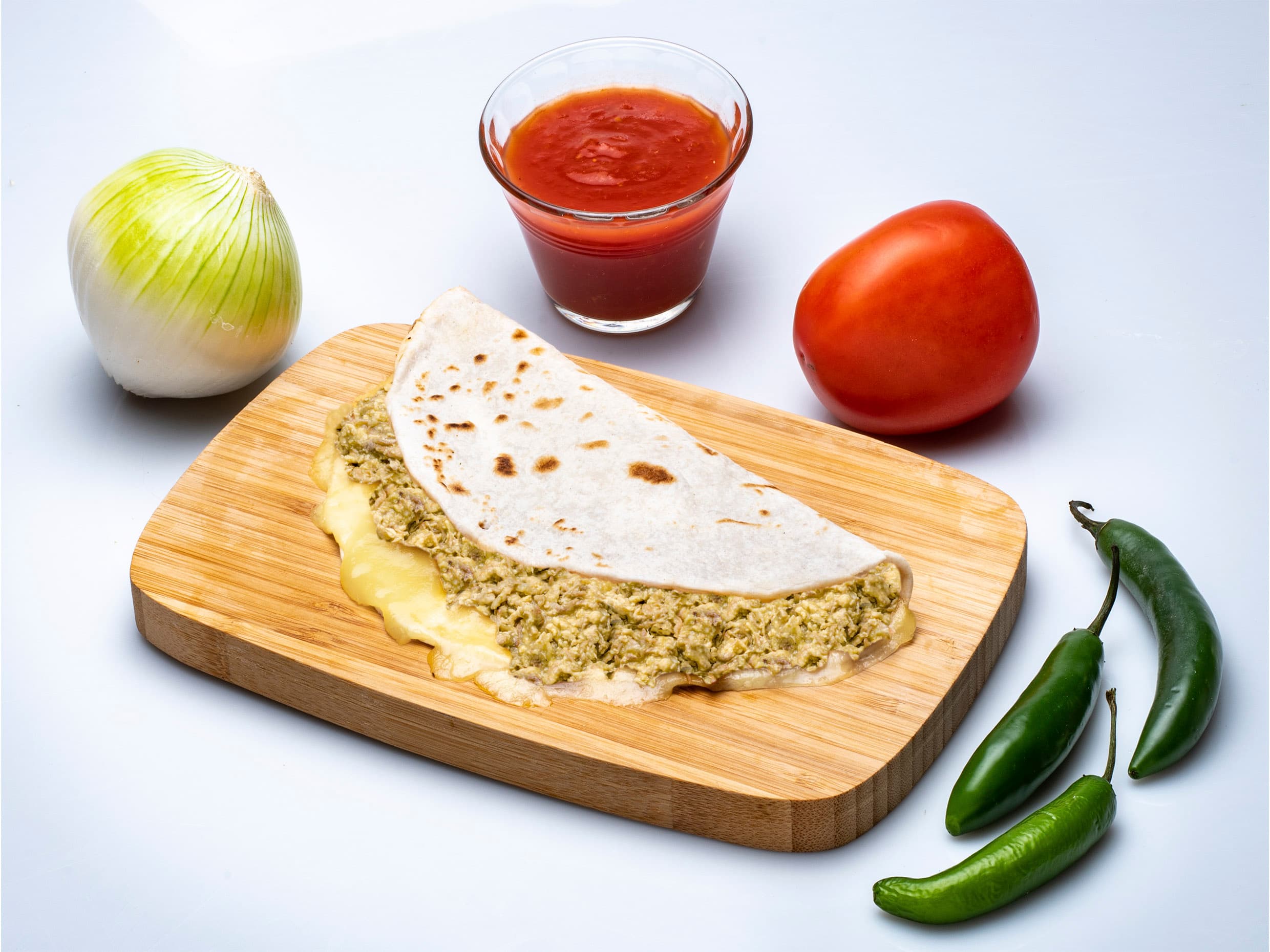 Quesadilla de Harina con Chicharrón en salsa verde