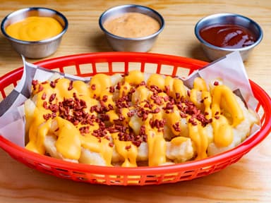 Papas con queso y tocino