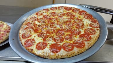 Combo Pizza Pepperoni + Refresco Familiar