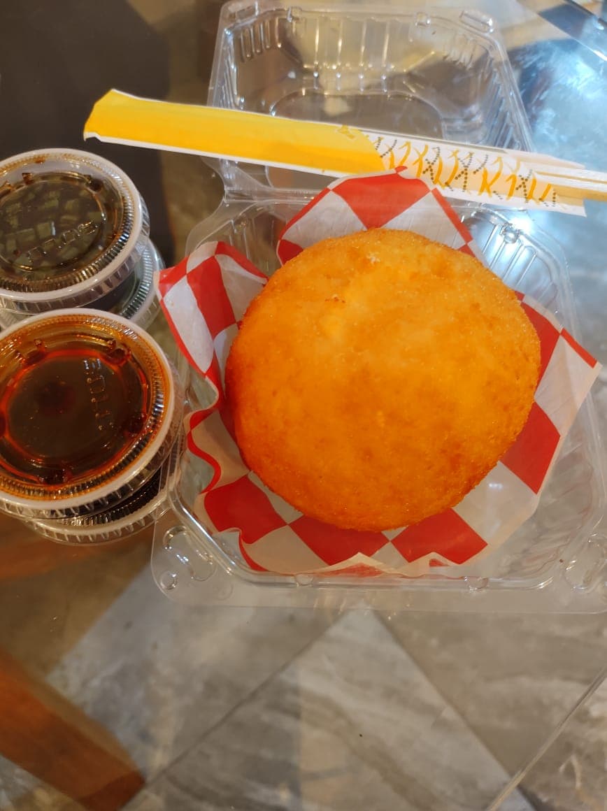 1 Bola de Arroz Los Arcos + 1 Coca Cola