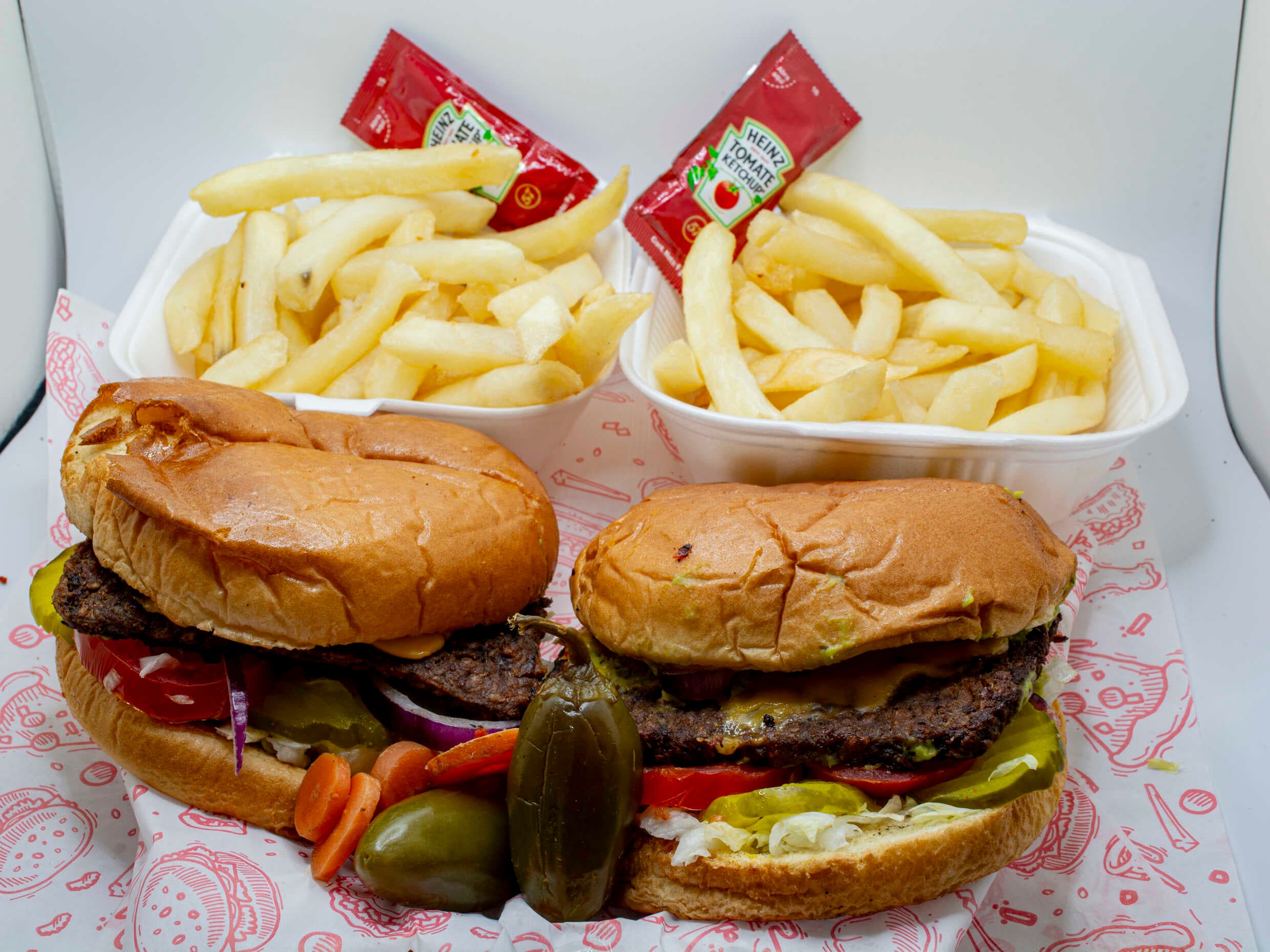 Combo Dos Hamburguesas más Dos Papas Fritas
