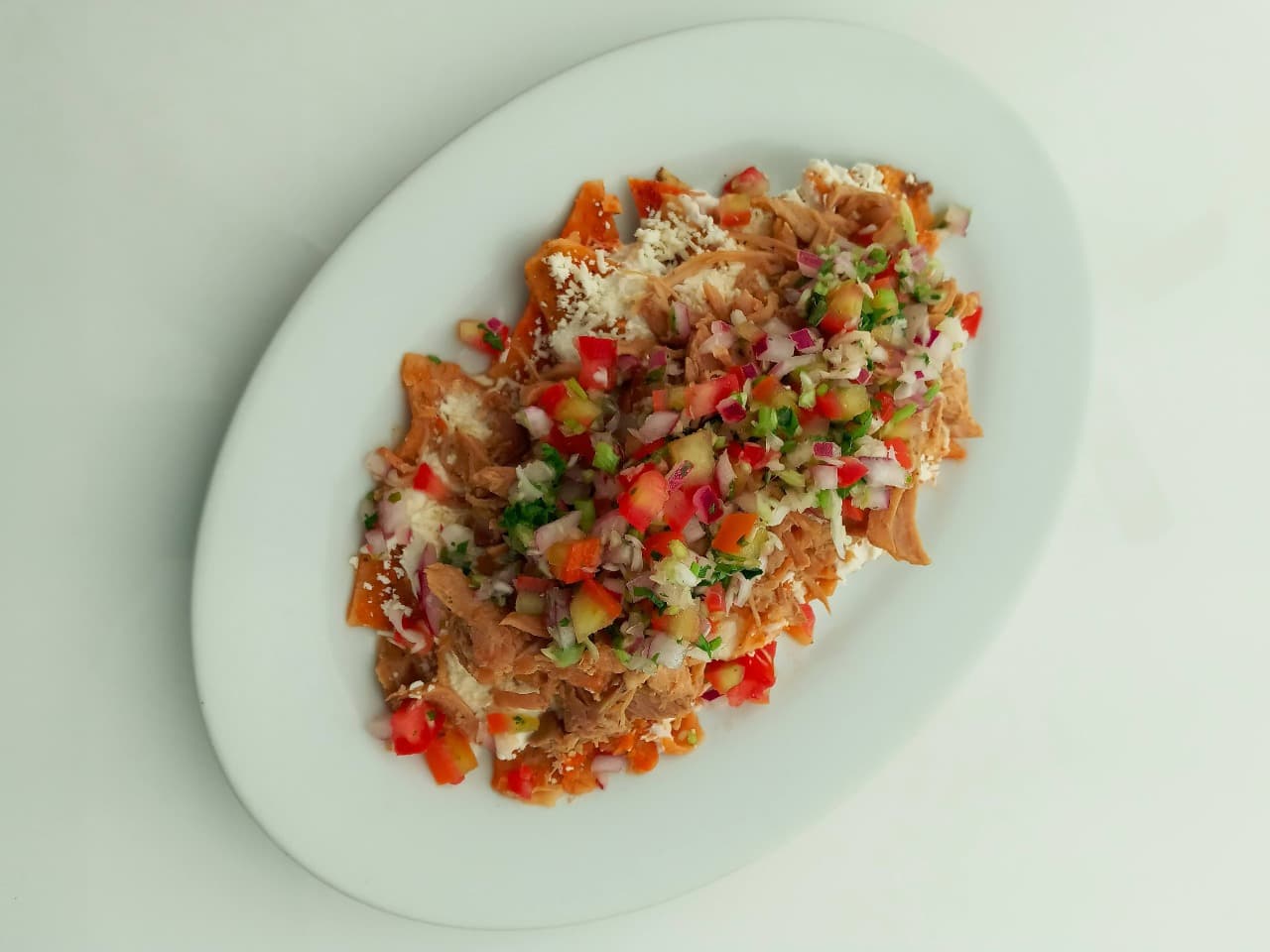 Chilaquiles con Lechón al Horno