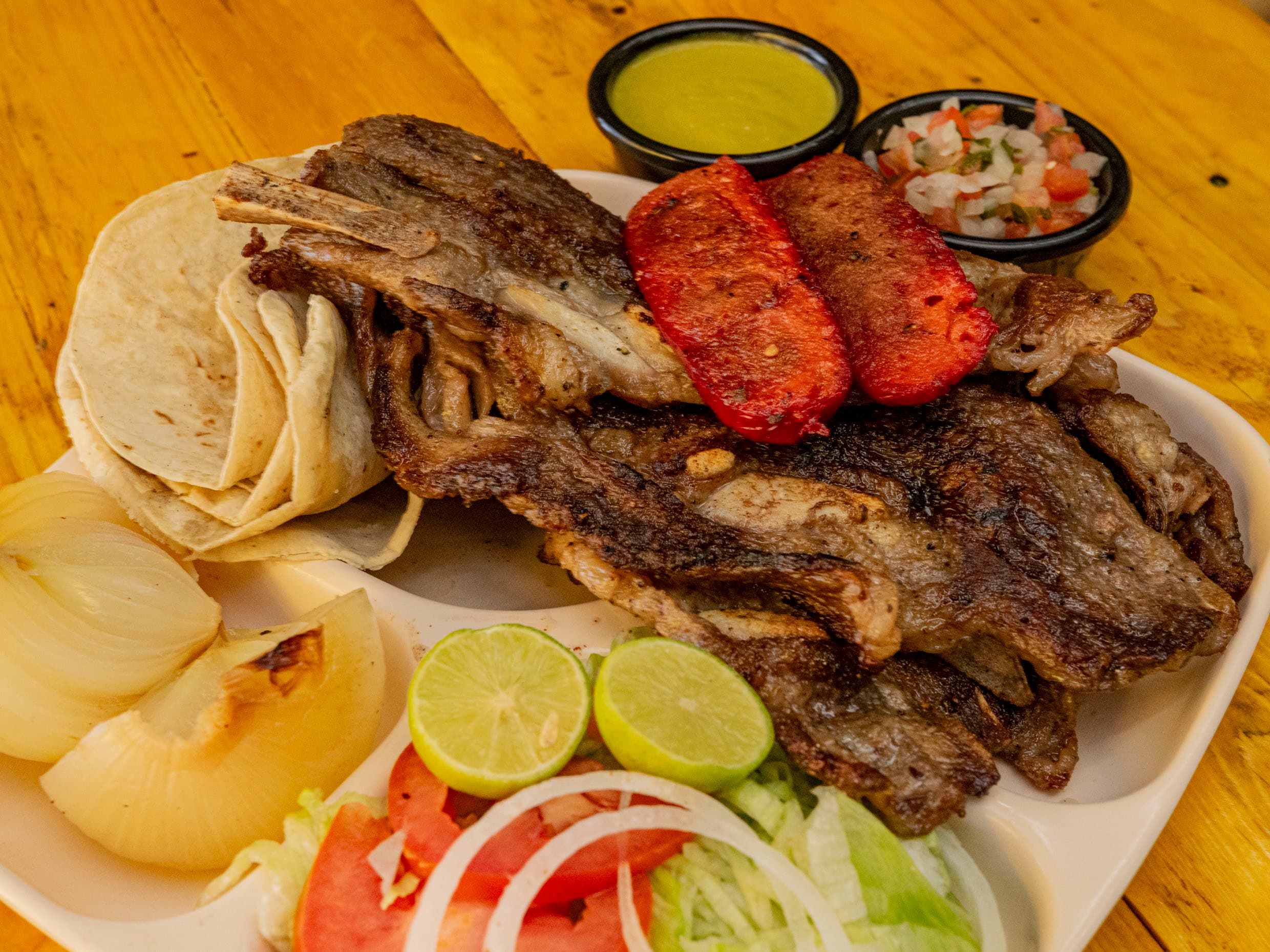 1/2 ORDEN DE COSTILLA ASADA
