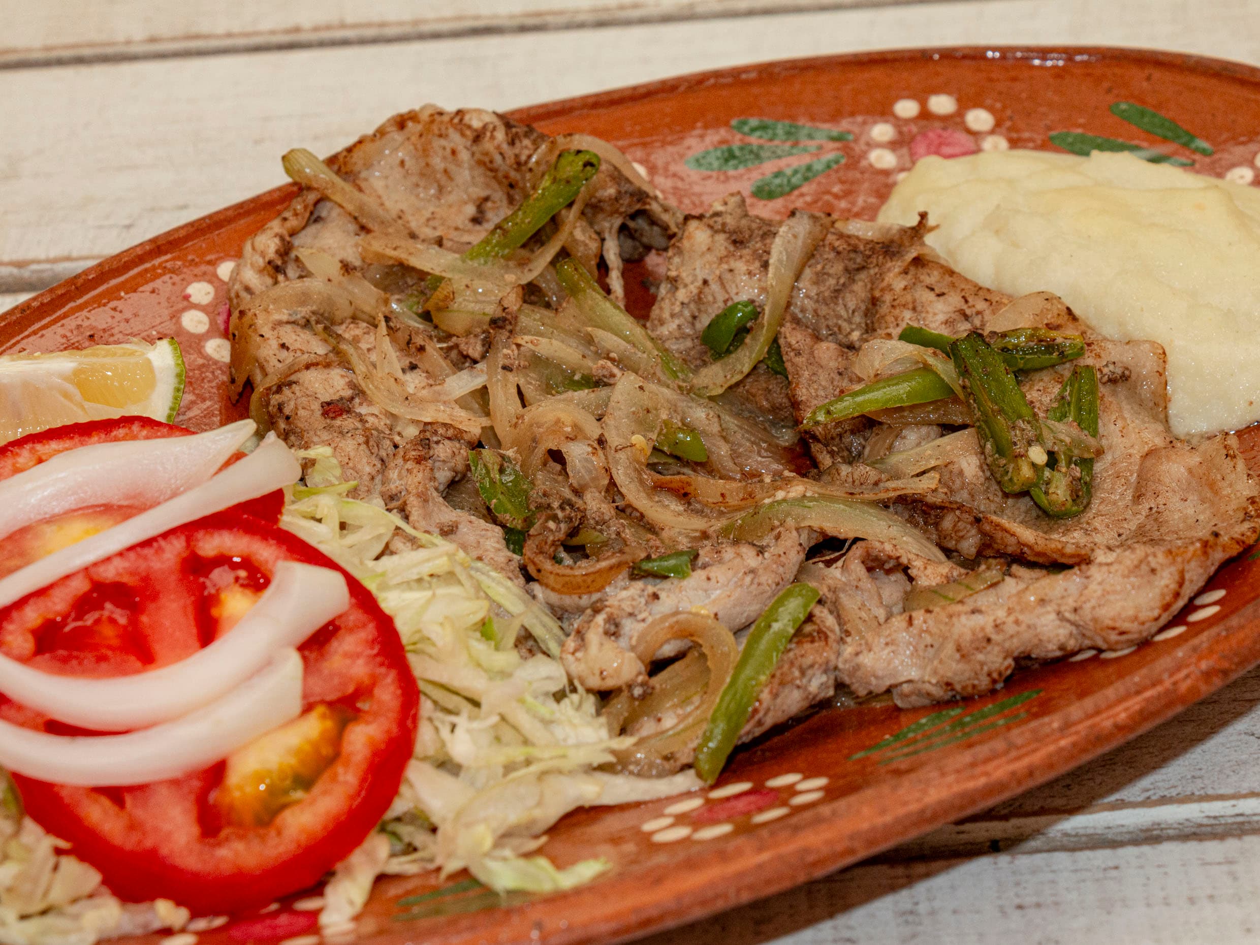 Bistec Encebollado