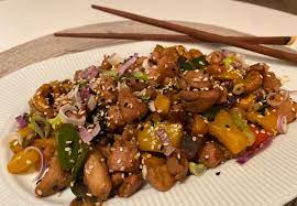 Verduras en Salsa de Ostión con Semilla de Maranon