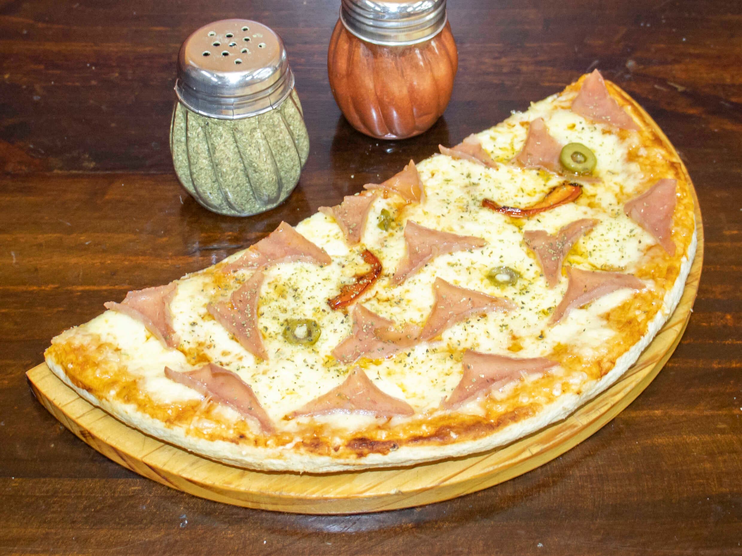 Pizza La Caprichosa Mediana(mitad de pizza)