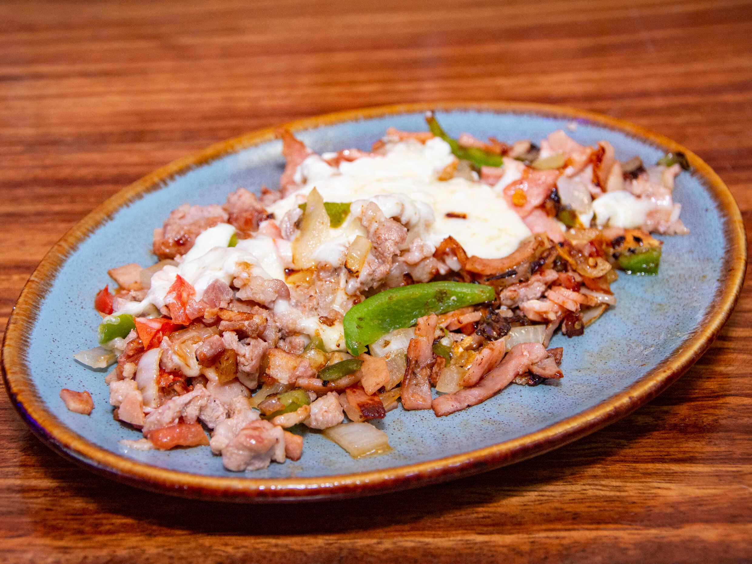 Platillo De Bistec Con Queso