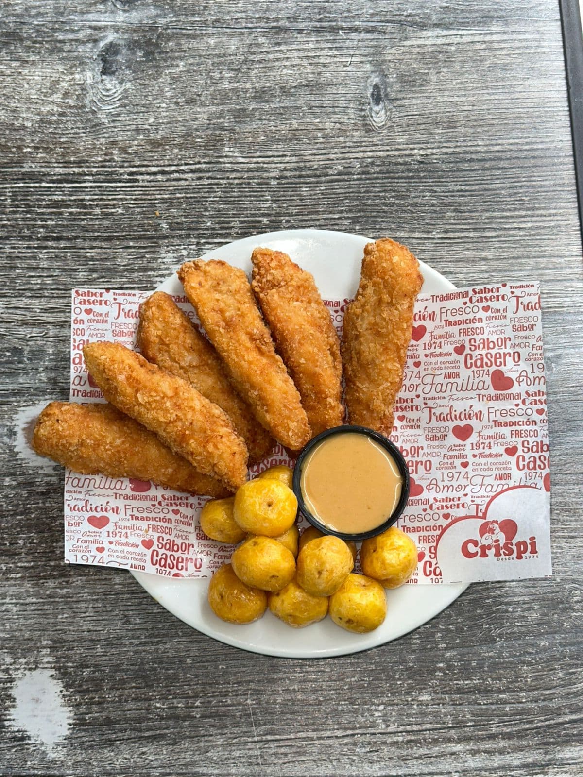 Crispi Tenders x6 + papas + salsa crispi