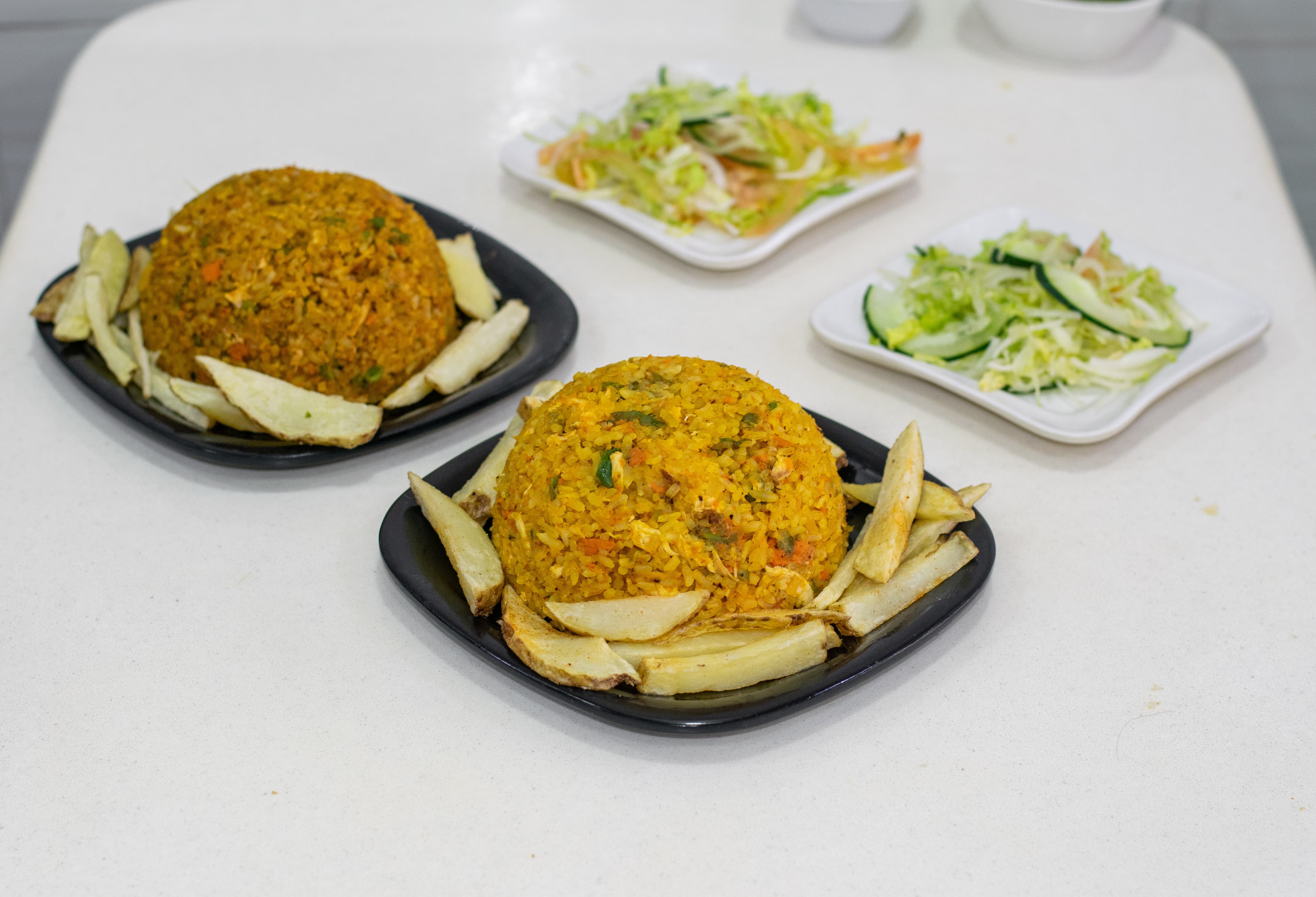 2 arroz con pollo + Papa a la francesa + Ensalada